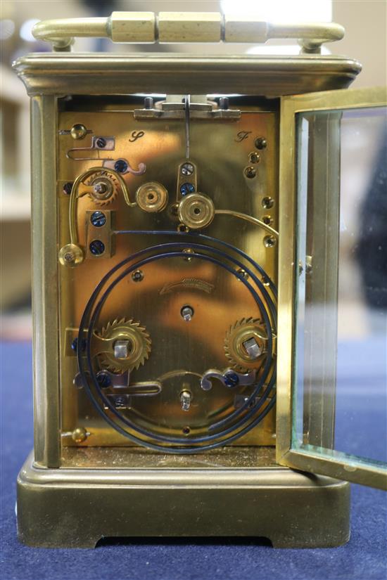 A French eight day repeating carriage clock, retailed by Camerer Kuss